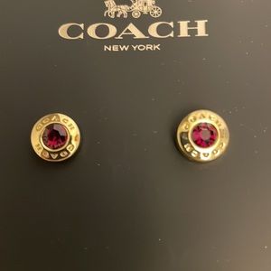 New Coach red/gold stud.